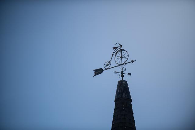 91ɫ, MA bicycle clock tower weather vane.